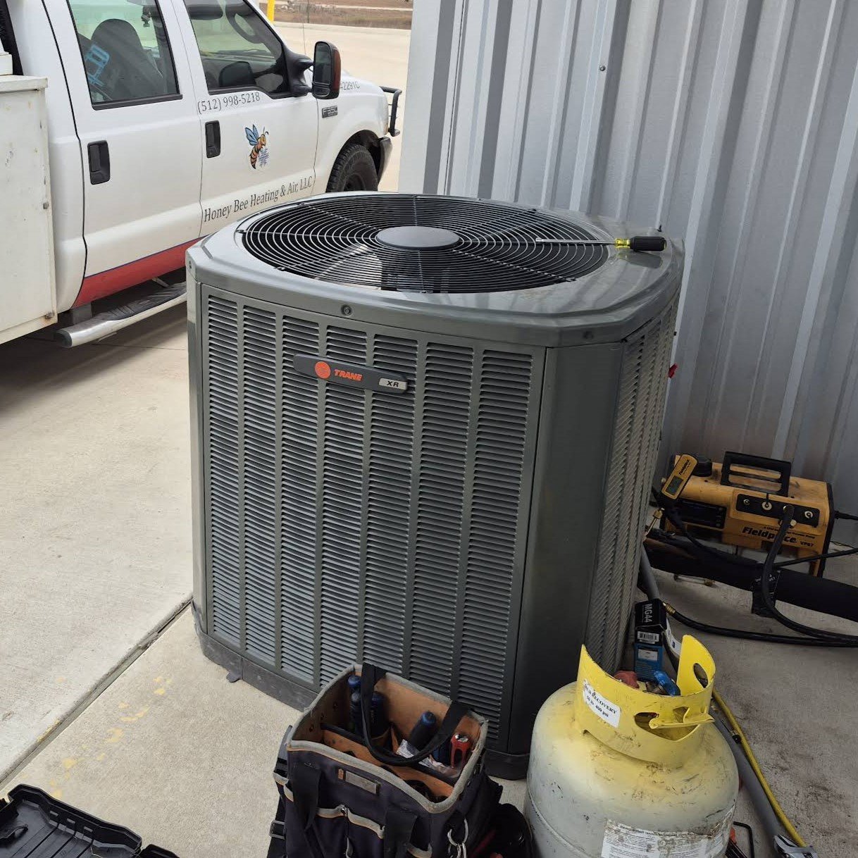 Honeybee Heating and Air, LLC technicians, providing expert HVAC services in Tulsa.